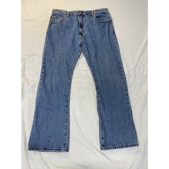 Levi's Other - Levi's 517 Bootcut Jeans 40x32 Medium Wash Blue Distressed Hem
